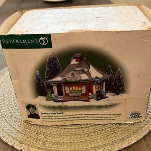 DEPARTMENT 56 Dorothy’s Skate Rental Dorothy Hamill The Heritage Village